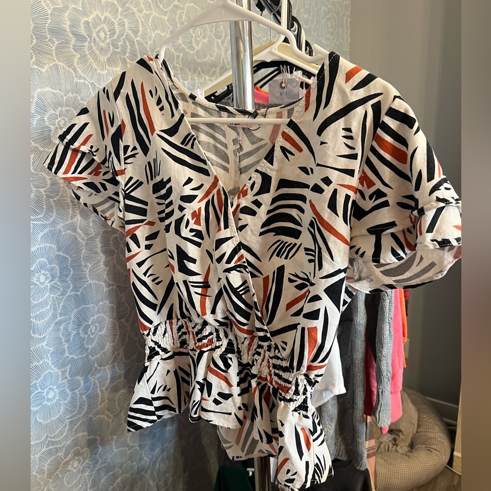 Abstract peplum top